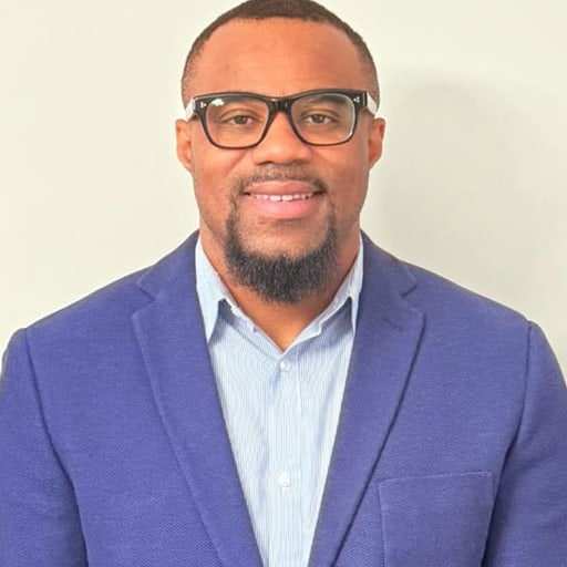 Portrait of Ifeanyichukwu Nkwocha, RN, Chief Operating Officer and Operations Director of Loyal Healthcare.